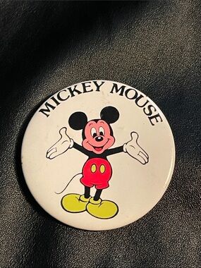 Disney’s 70’s Mickey Mouse White Round Party Button Pin with Red/Yellow Accents.
